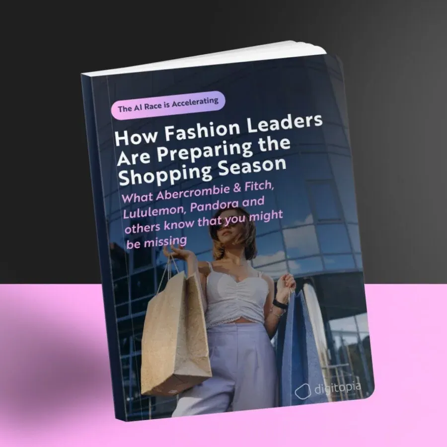 The fashion retail e-book standing upright, its cover on a black and pink background.