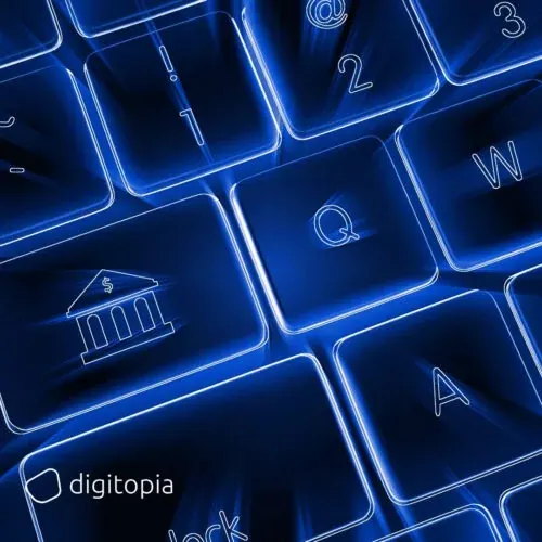A backlit blue keyboard with a bank building icon glowing on one of its keys
