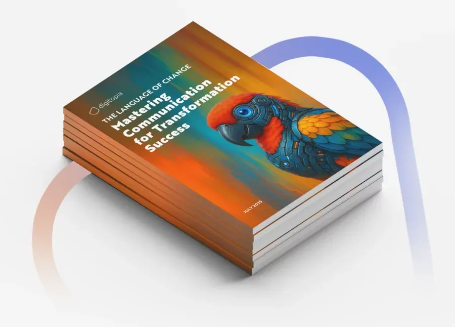 A stack of printed copies of Mastering Communication for Transformation Success seen from above.