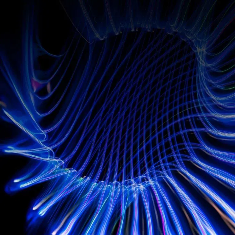 The e-book’s cover artwork: long-exposure blue and white light trails curving away from a dark centre.