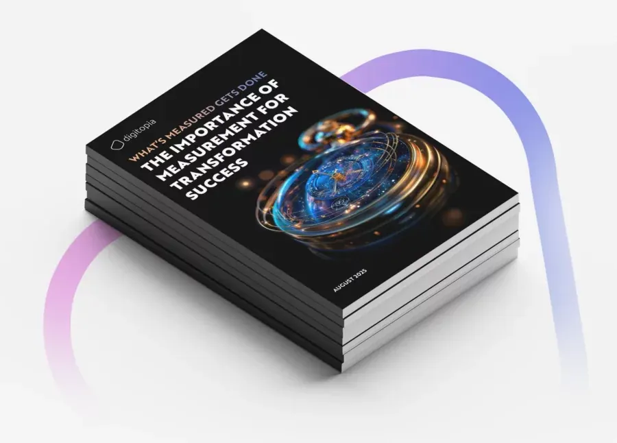 A stack of printed copies of the measurement e-book seen from above.