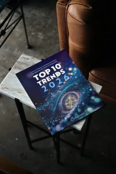 A printed copy of the Top 10 Trends 2026 report lying on a marble side table