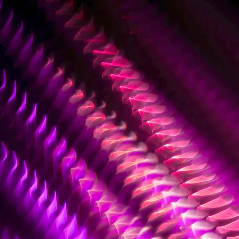 The playbook’s cover artwork: rows of magenta and violet light folding away into the dark.