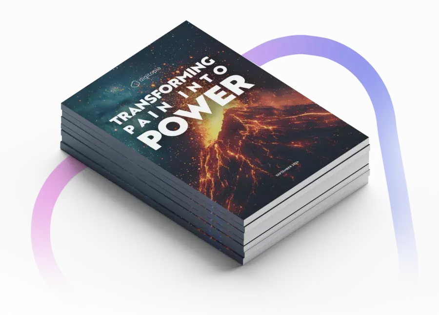 A stack of printed copies of Transforming Pain into Power seen from above.